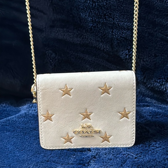 Coach Handbags - Coach cream gold star chained wallet!!